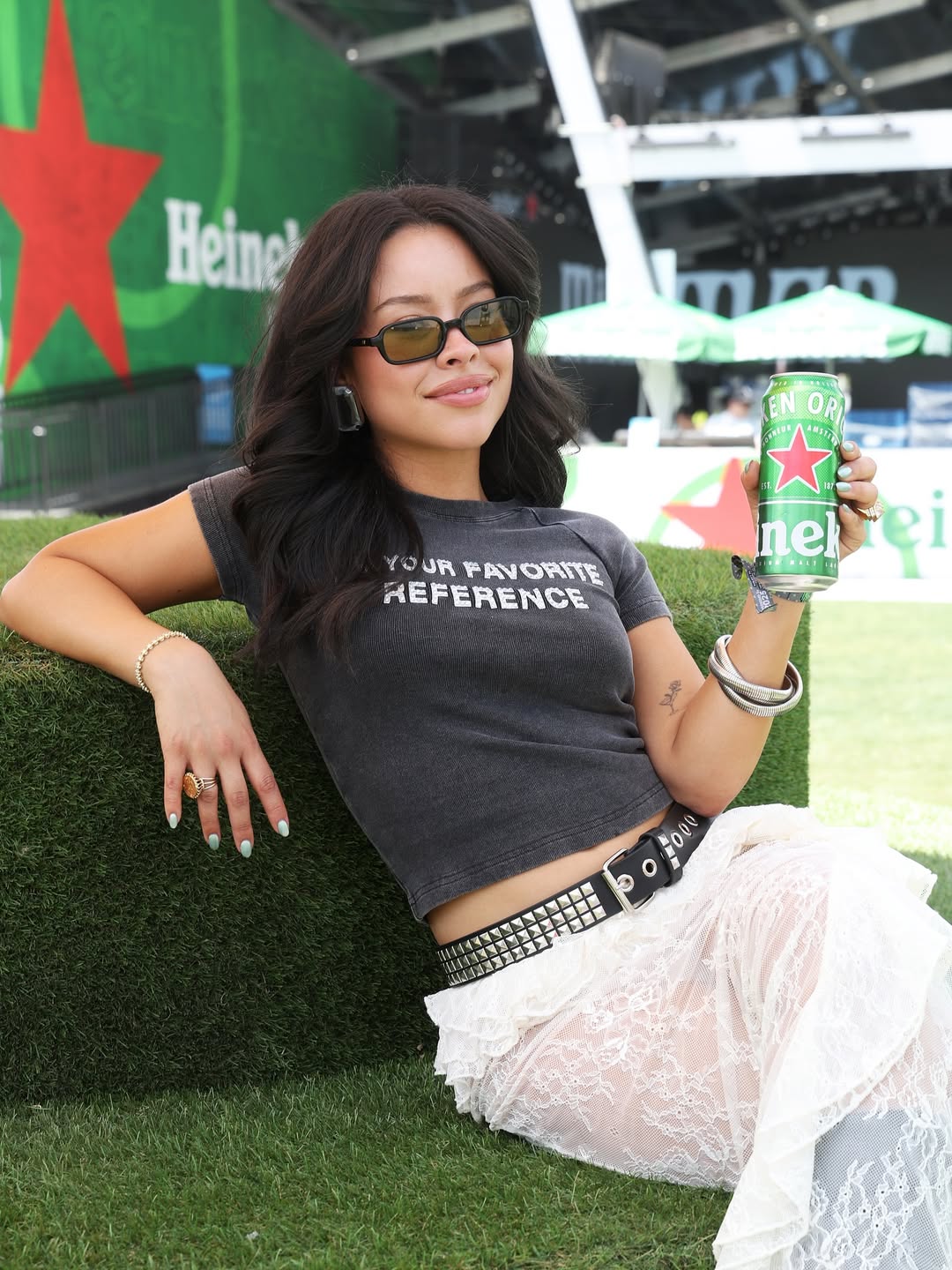 Instagram post by @cierraramirez for Heineken US. Caption reads: Music & a cold @heineken_us in hand? Name a better....