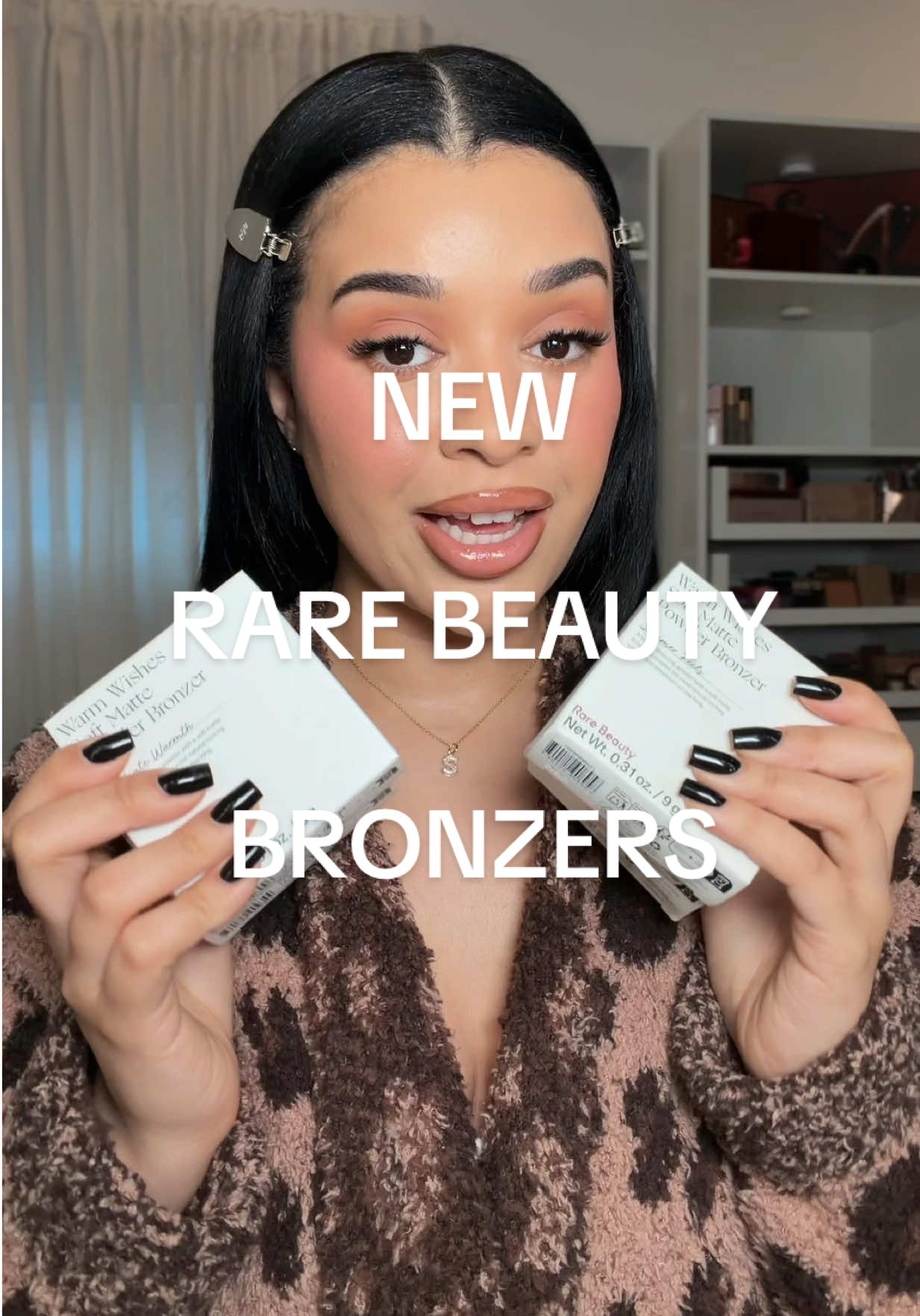 TikTok post by @shanell.sorrells for Rare Beauty. Caption reads: Trying out the new @Rare Beauty bronzers 👀👀👀🤎....
