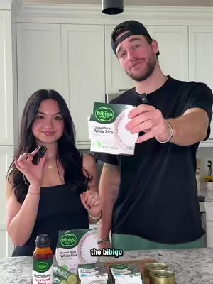 TikTok post by @angelac0123 for bibigo USA. Caption reads: [...] own cooking show😂🧑🏻‍🍳 using the @bibigo....