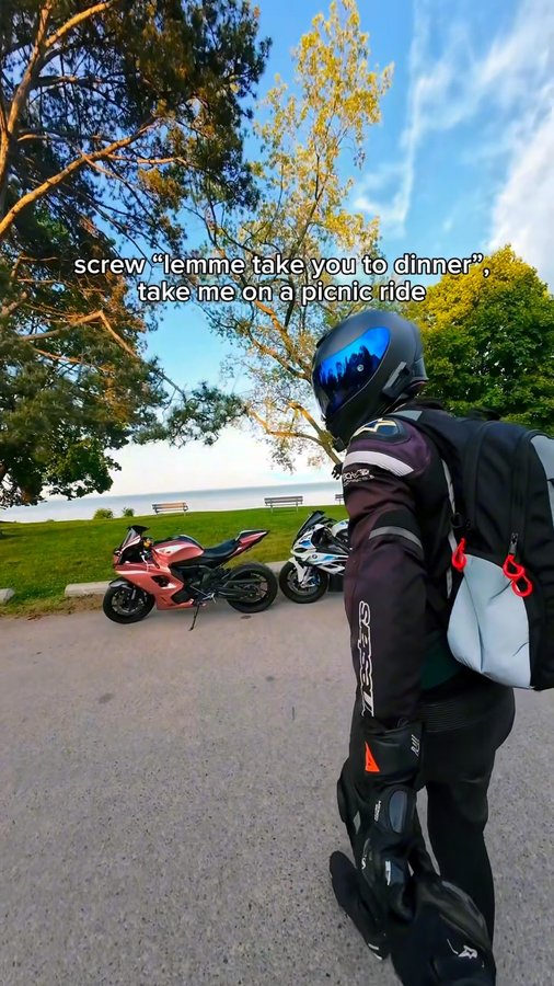 Instagram post by @twowheelcouple for MotoLoot. Caption reads: [...] Reflective Motorcycle Backpack from....