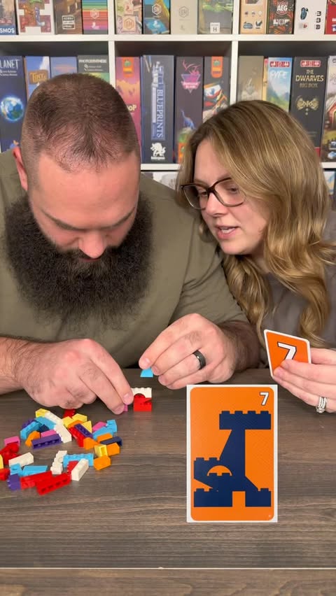 Instagram post by an influencer for Asmodee USA. Caption reads: A Lego Board Game?! Play Brick Like This With Us!....