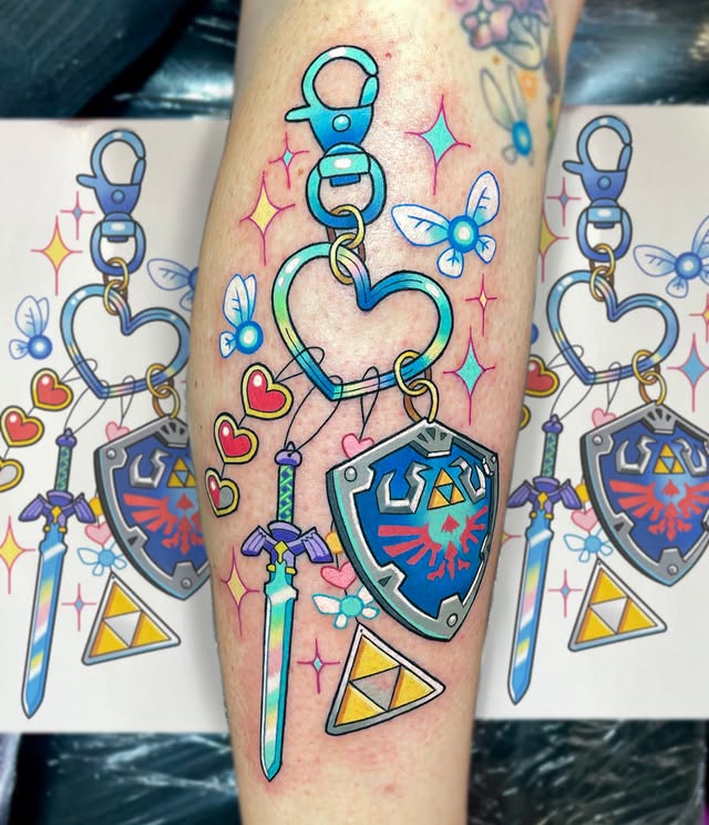 Instagram post by @deadpan_anne_tattoo for Barber DTS Tattoo Supplies. Caption reads: 💙Zelda Keychain💙 Thank you @keepingmummysane....