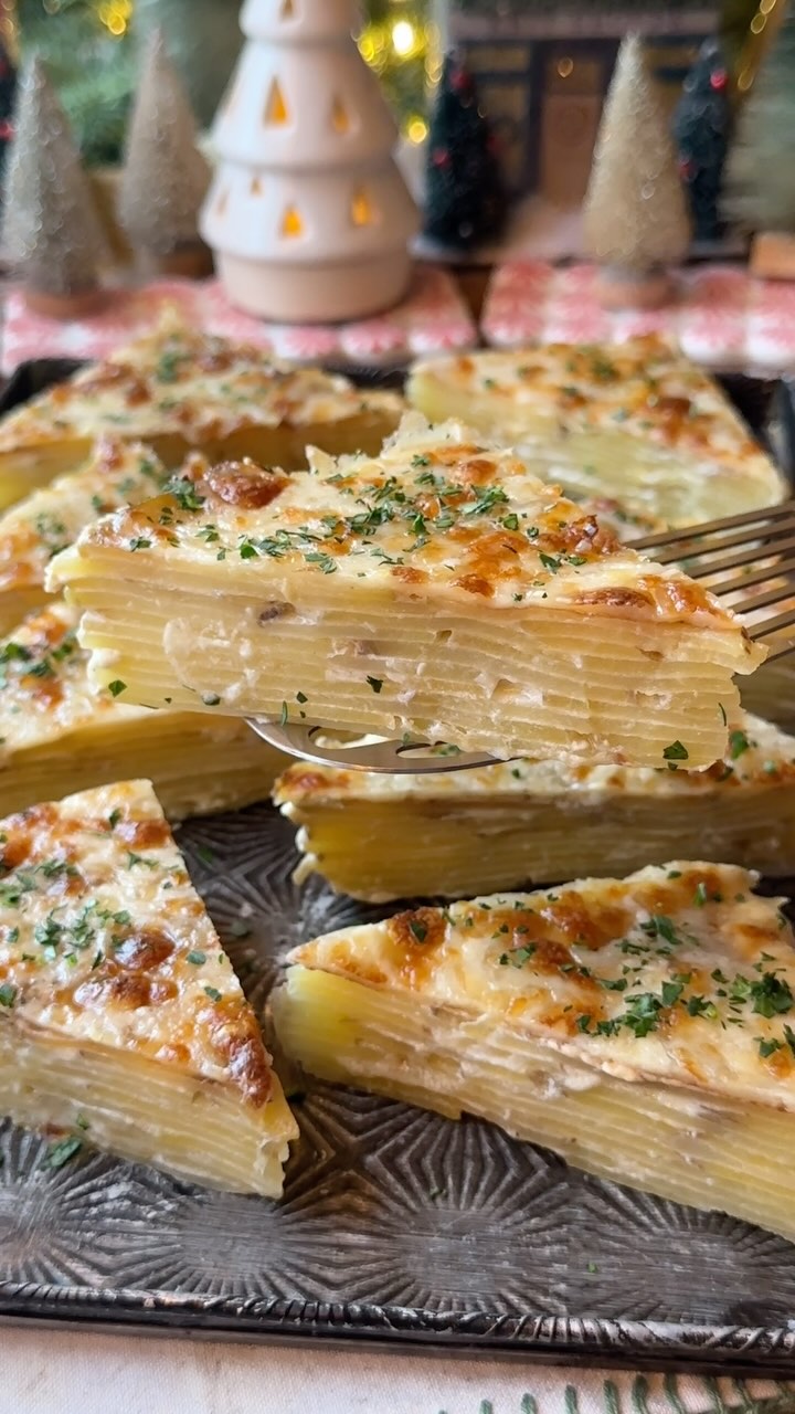 Instagram post by @crowded_kitchen for gonnaneedmilk. Caption reads: Dauphinoise Potatoes for Day 3 of our Recipe....