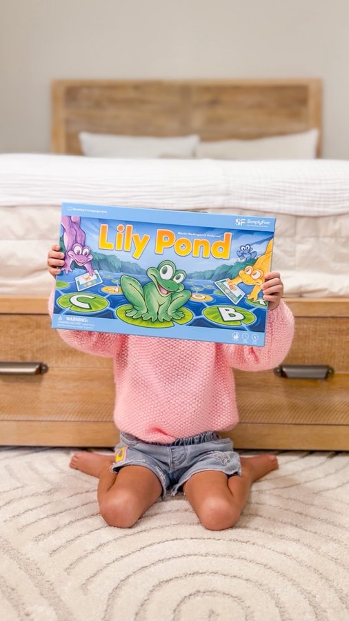 Instagram post by @idkivy for SimplyFun. Caption reads: #ad @simplyfun - Game night just turned into a....