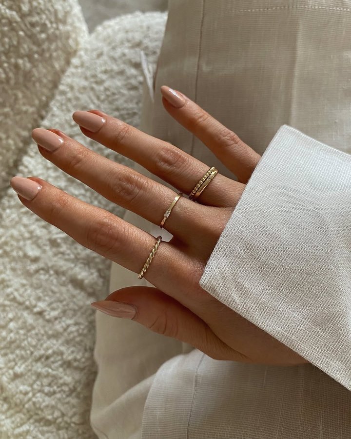 Instagram post by @oliviacharlotteburton for Aurate New York. Caption reads: Classic jewellery staples from @auratenewyork. Use....