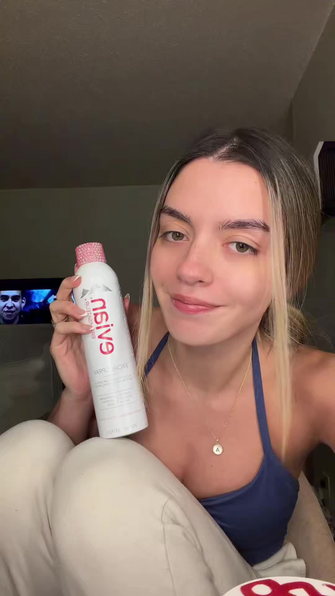 TikTok post by @graciereiley for Evian Facial Spray USA. Caption reads: @Evian Facial Spray will always be a staple in my....