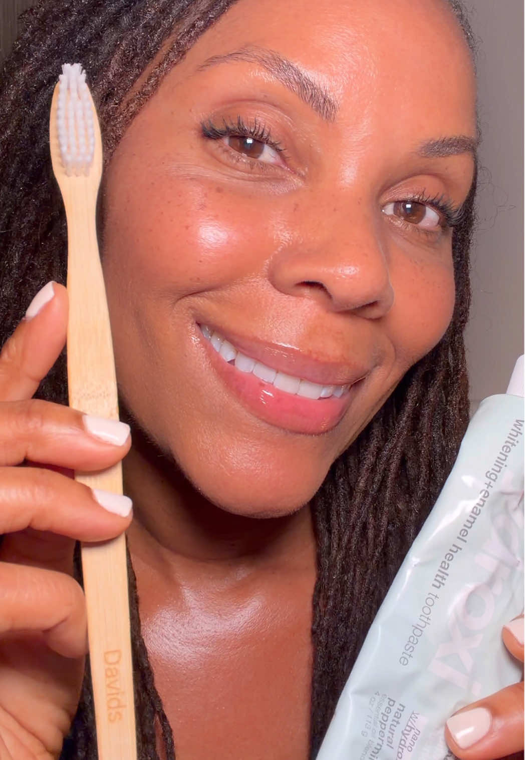 TikTok post by @beachbumwisdom for Davids Natural Toothpaste. Caption reads: @Davids Premium Oral Care has been such a game....