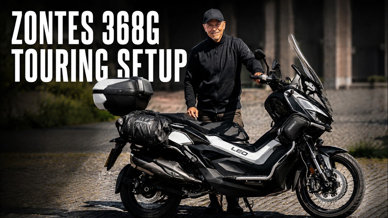 YouTube post by @Marc.Stones for Carpuride. Caption reads: [...] GIVI Maxia 5: * 👉 Top Box Rack: * 👉....