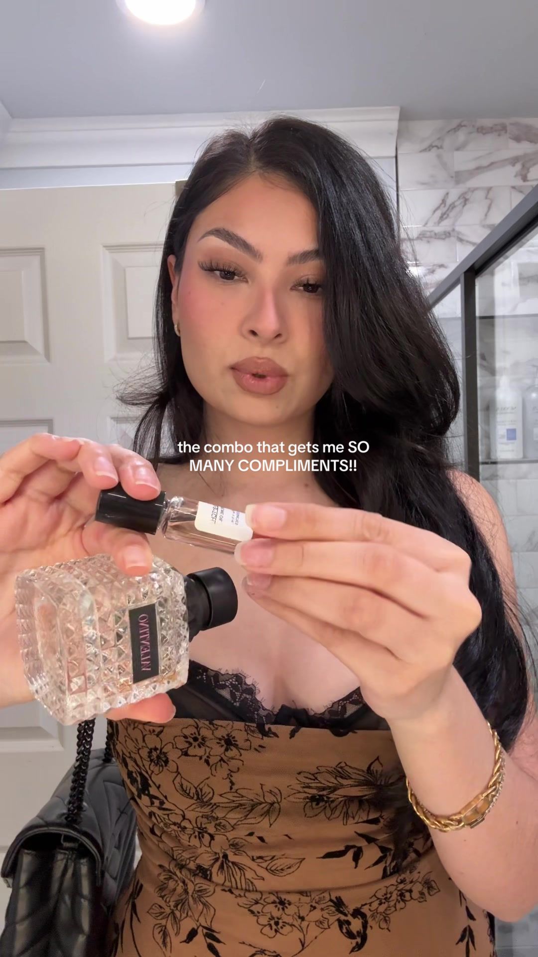 TikTok post by @ashleymaganaa_ for DLA COSMETICS. Caption reads: the perfume oils by @DLA COSMETICS are a MUST in....