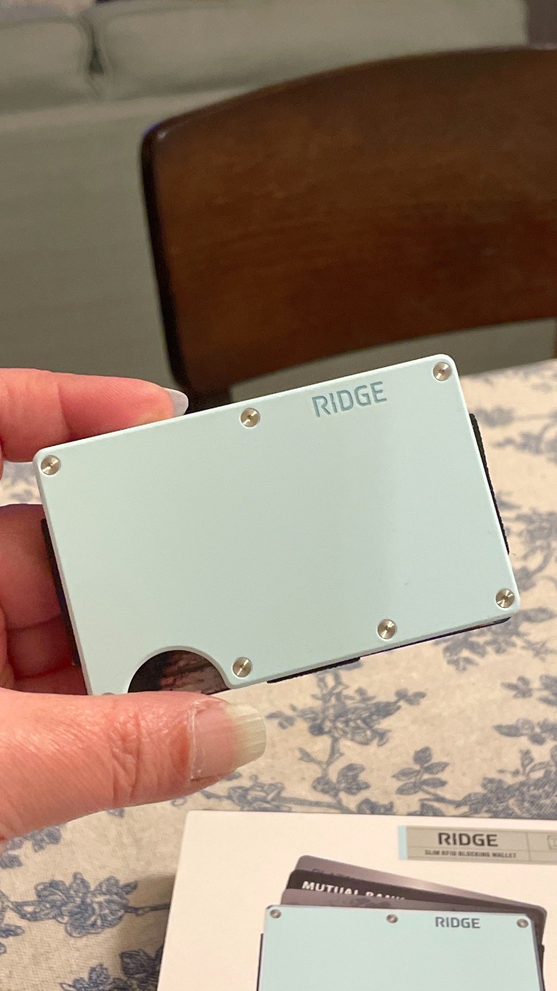 Instagram post by @theproductobsessedmom for Ridge. Caption reads: The Ridge Wallet definitely cut down on bulk for....