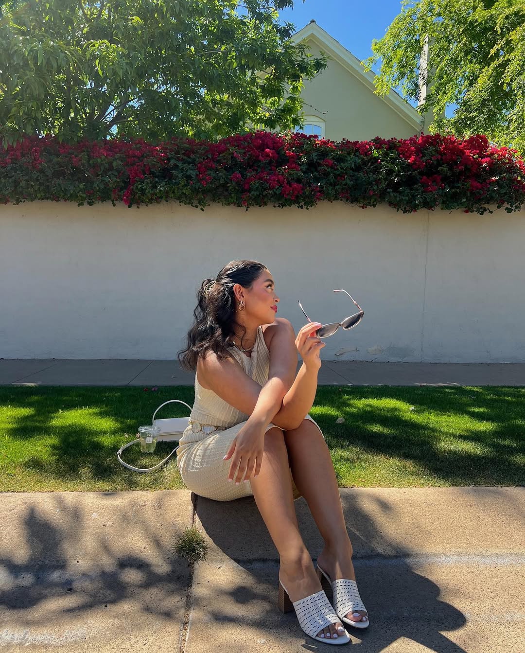 Instagram post by @michaelajacobs for InfluenceHer Collective. Caption reads: Spring outfits and the perfect accessories....