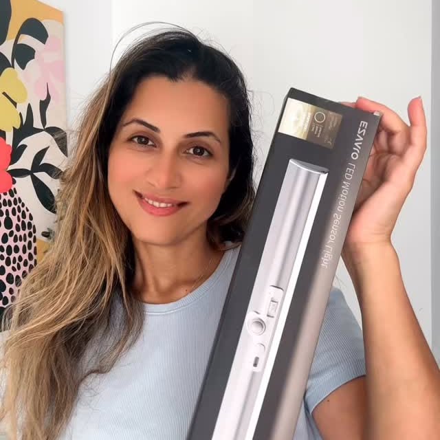 Instagram post by @azrandmom for EZVALO. Caption reads: ✨ Smart lighting that blends into your life....