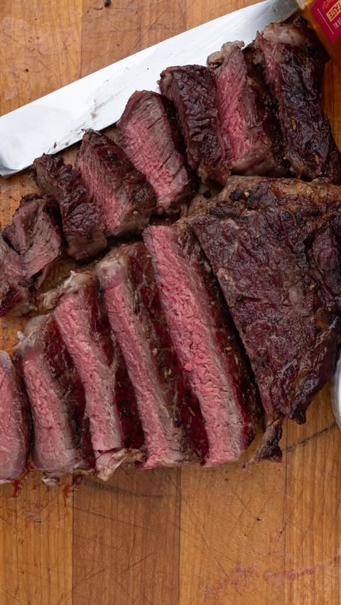 Instagram post by @blackdog_bbq for Pit Boss Grills. Caption reads: When the holidays come around, I like to make....