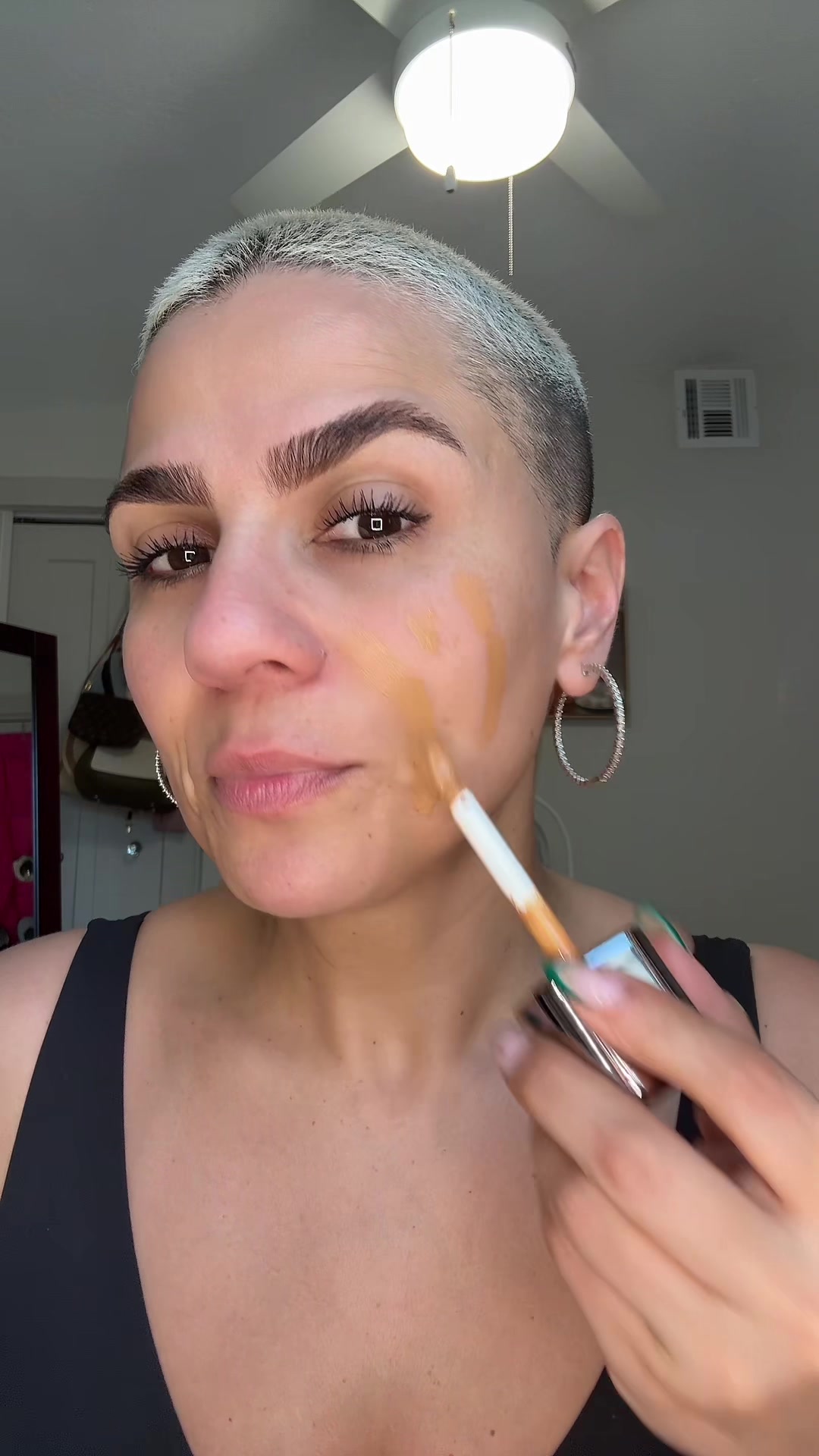 TikTok post by @adailydoseofnikki for BossUp Cosmetics. Caption reads: @BossUp Cosmetics @aboutface #makeup #foundation....