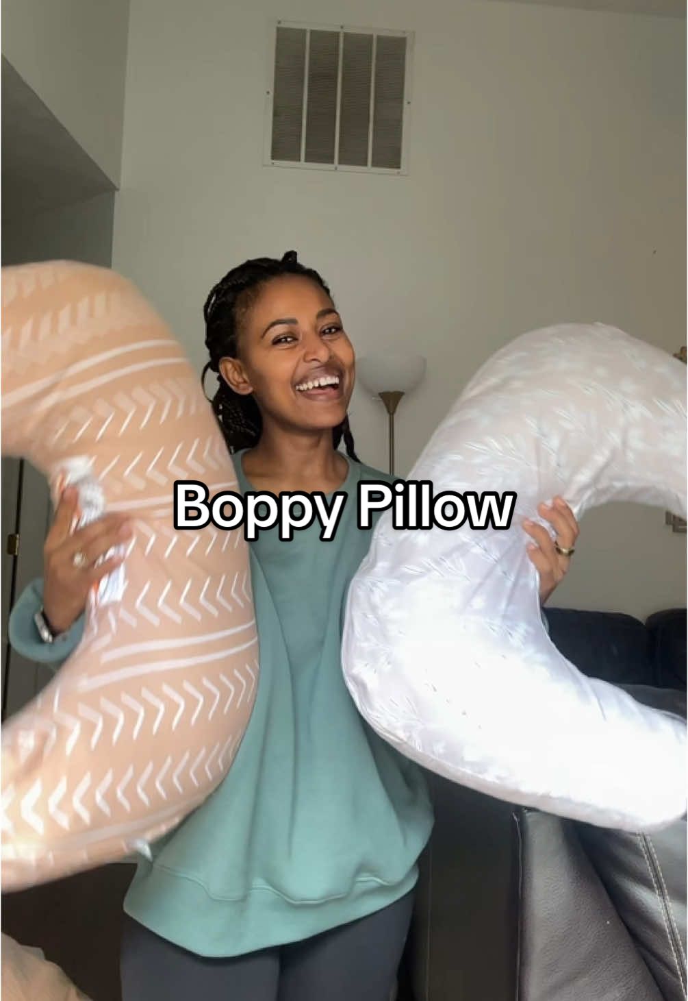 TikTok post by @karisbellofficial for Boppy Italia. Caption reads: #ad Sharing my go-to home-alone feeding routine....