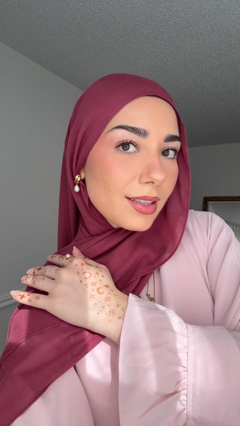 Instagram post by @ayaspire_ for Veiled. Caption reads: [...] are 2 ways I’m styling my earrings with....