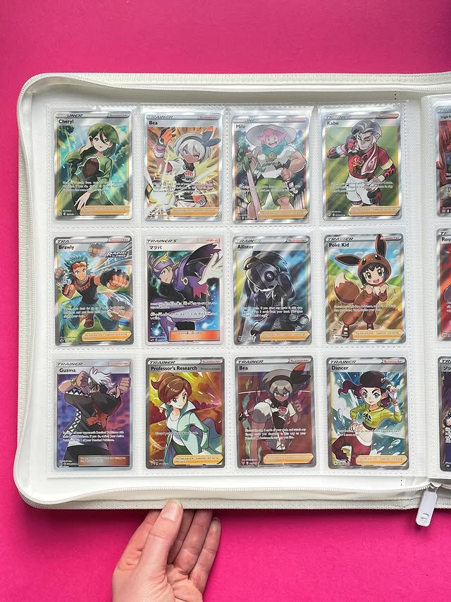 Instagram post by @heyitsnicola_ for Vault X. Caption reads: [...] tire of looking at my tcg collection in....