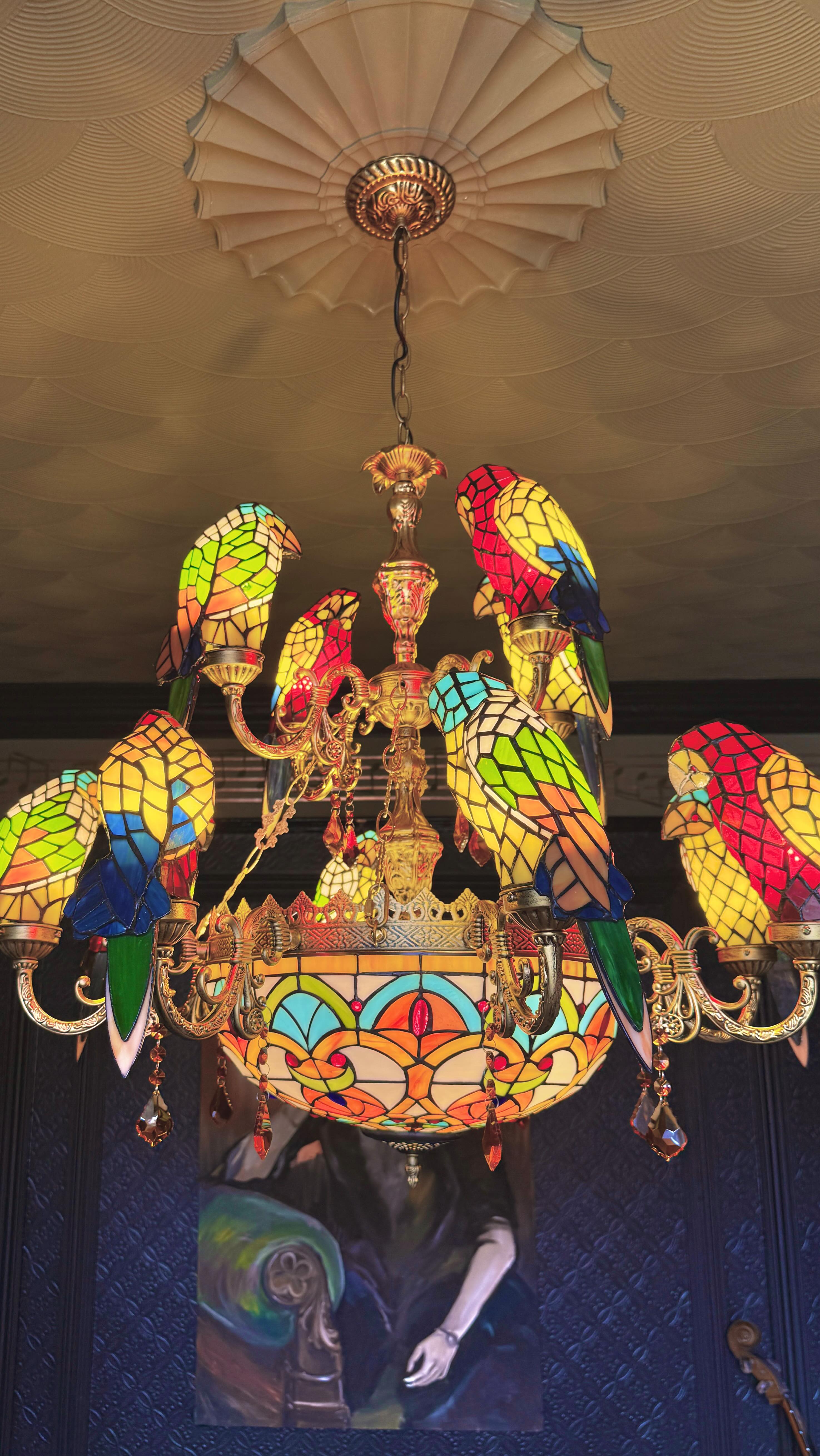 Instagram post by @bland_design for Residence Supply. Caption reads: [...] with this Parrot chandelier from....