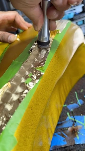 Instagram post by @imortalines for Tropical Glitz. Caption reads: 💿 💿

#imortalines #goldleafart....