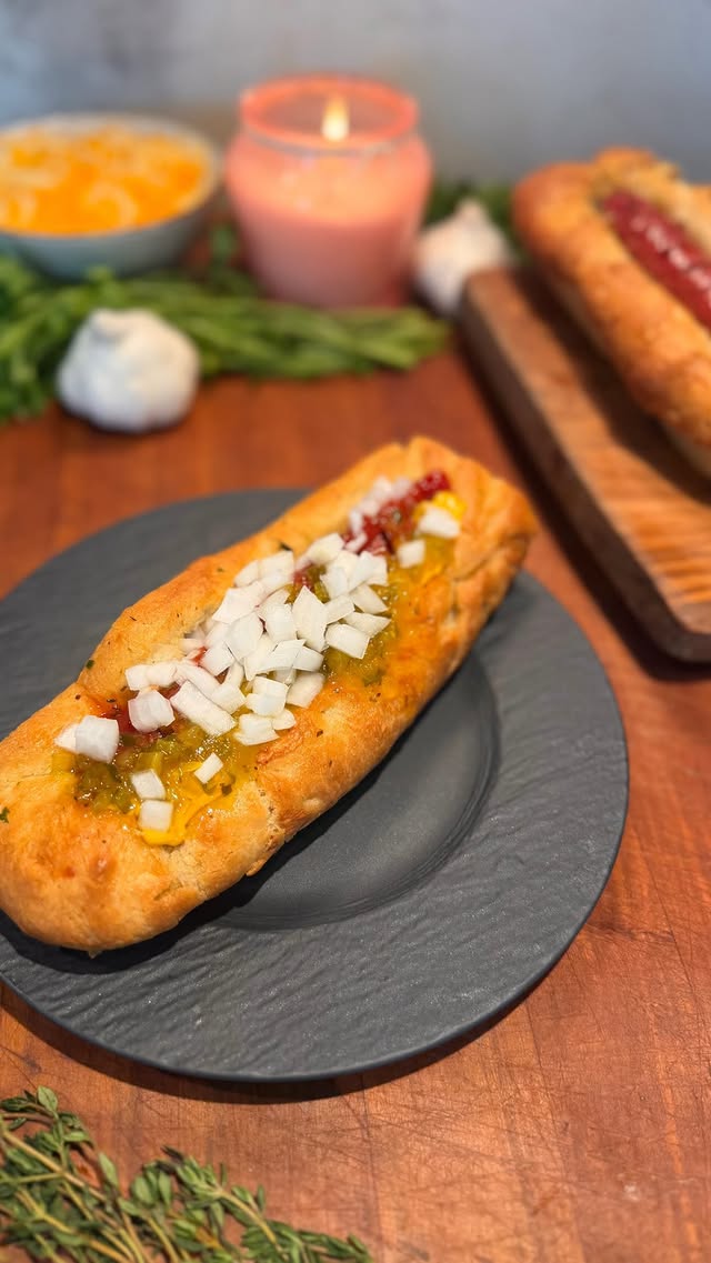 Instagram post by @cybelewells for The Feedfeed. Caption reads: #ad Comment ‘RECIPE’ to have this Hot Dog Focaccia....