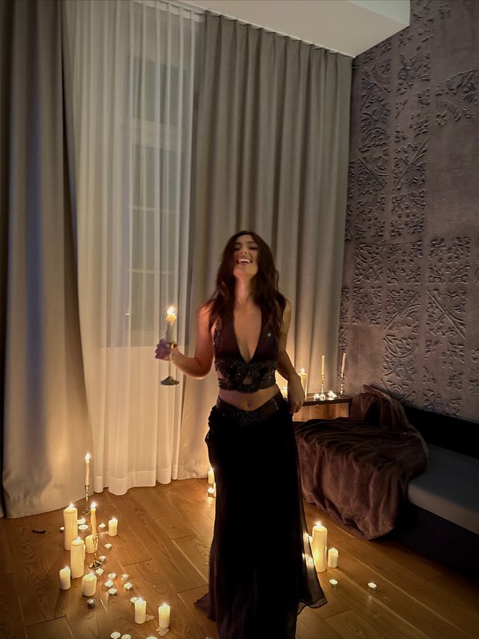 Instagram post by @graciezakk for Meshki. Caption reads: The witch rumors are true. The obsession makes....