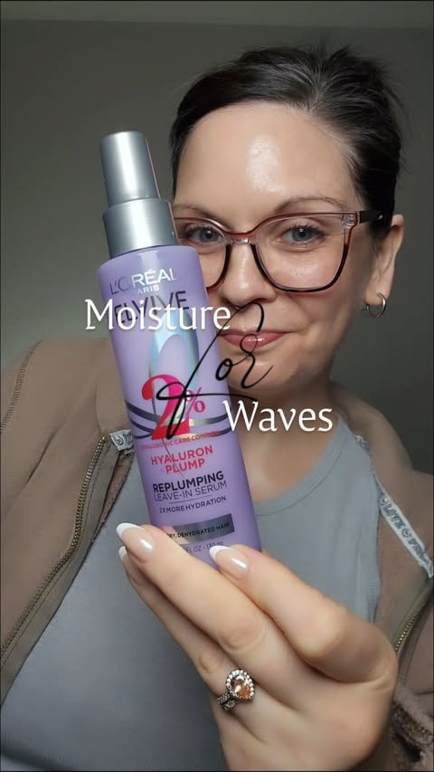 Instagram post by an influencer for L'Oréal Paris. Caption reads: POV: You forget wavy hair needs extra moisture…....