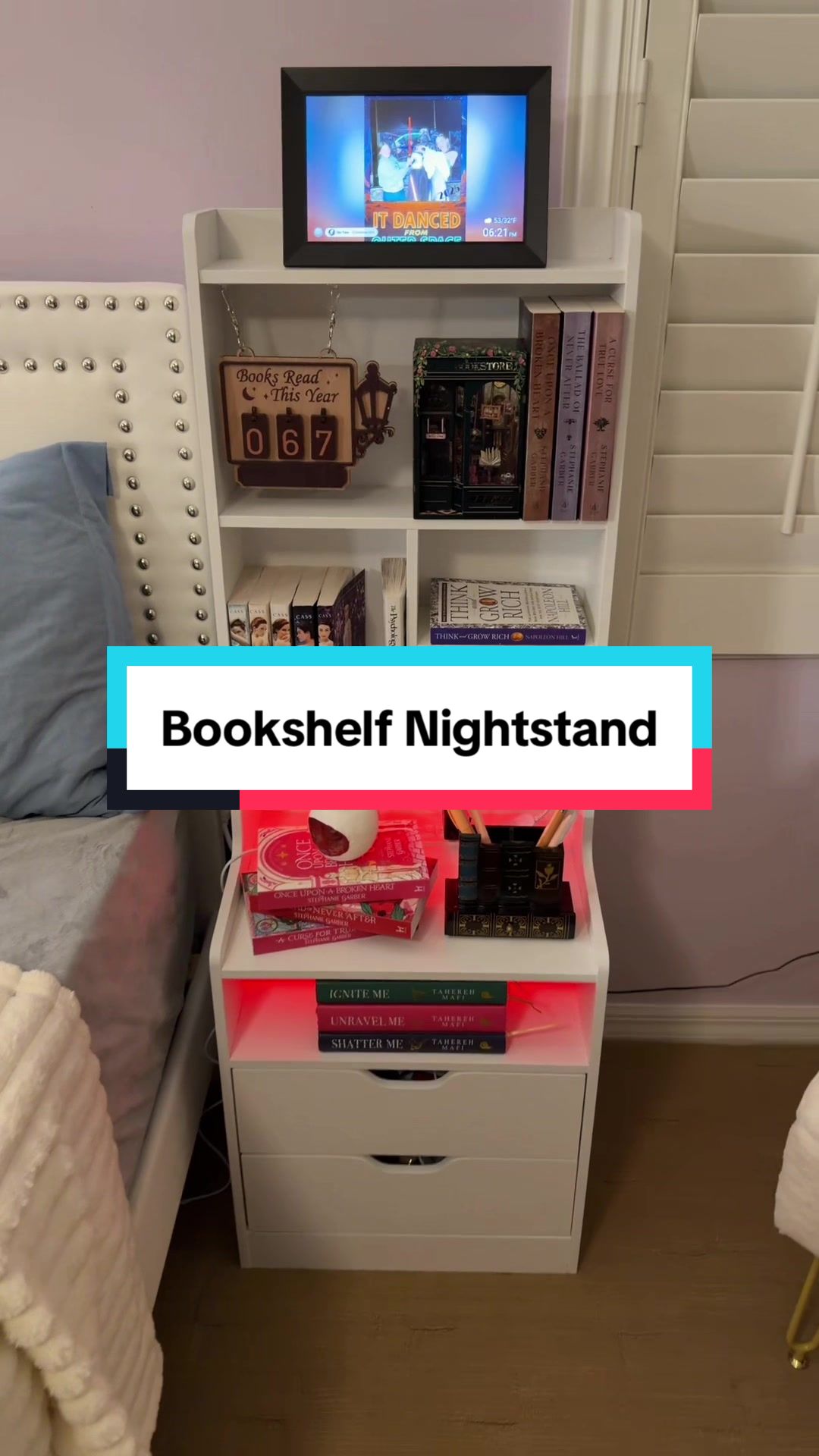 TikTok post by @ashleyroseinbloom for Sikaic. Caption reads: Such a cute way to display your books 📚 @Sikaic....