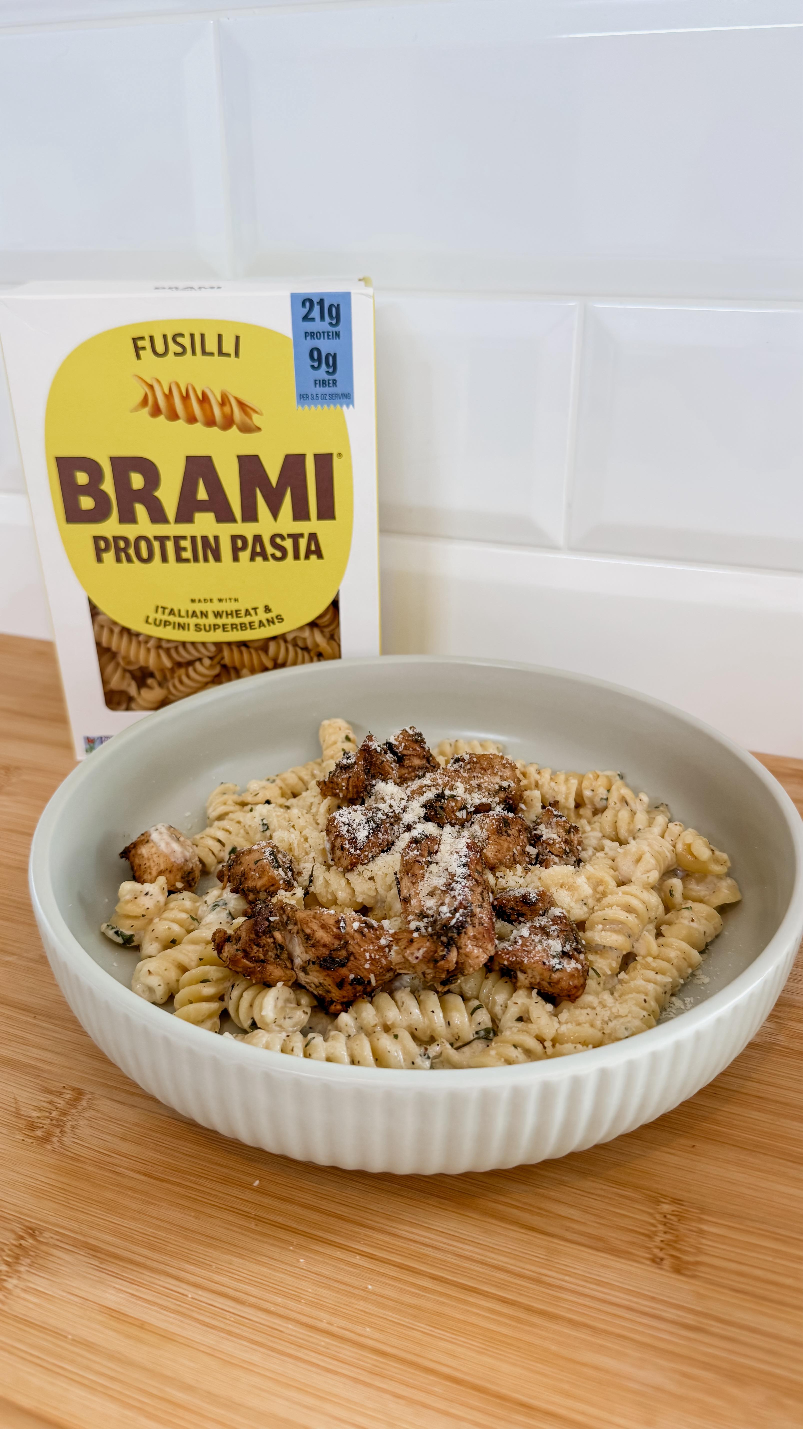 Instagram post by @itsmeghankay for Brami. Caption reads: This high protein @enjoybrami pasta tastes so good....