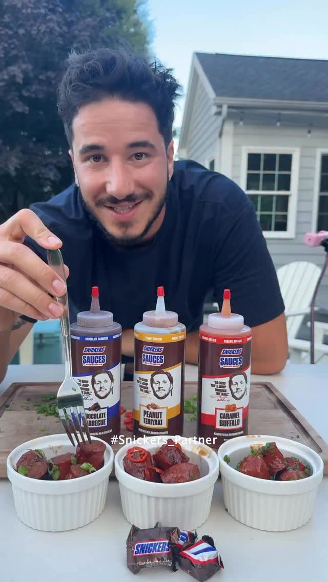 Instagram post by @chefcuso for Snickers. Caption reads: #Snickers_Partner Cooking up sausage burnt ends....