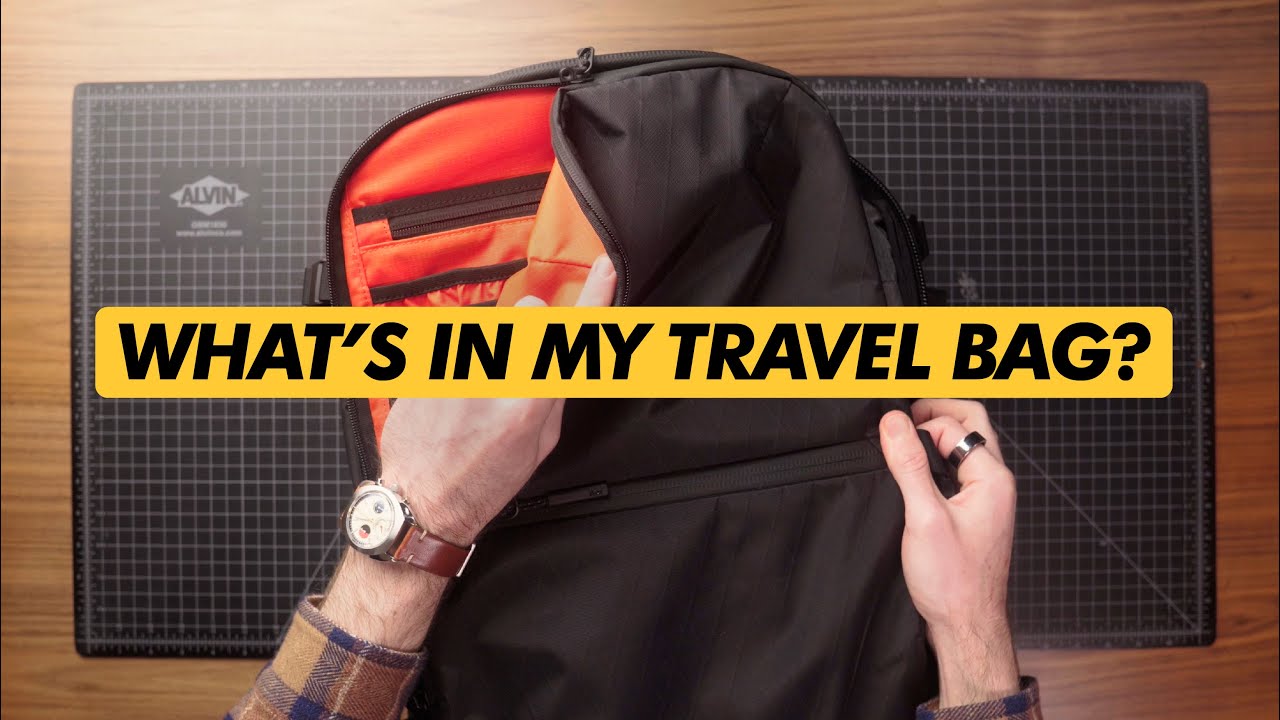 YouTube post by @joshfenn for Pakt Bags. Caption reads: What's in my Travel Bag? (Carry-On Only).