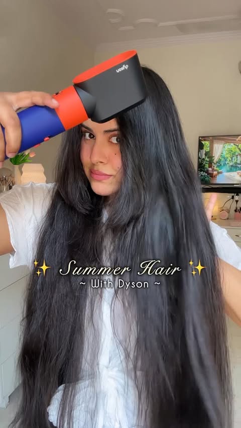Instagram post by @idivyaa for Dyson. Caption reads: Summer hair styling with @dyson_india 💜🧡....