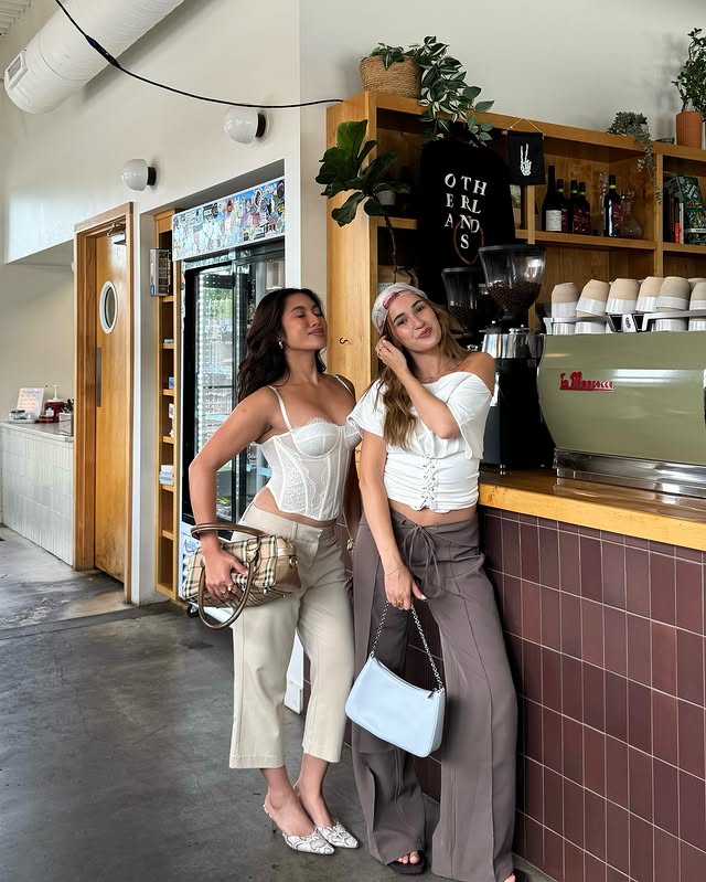 Instagram post by @guillanasocorro for JustFab. Caption reads: chronically accidentally matching shoes....