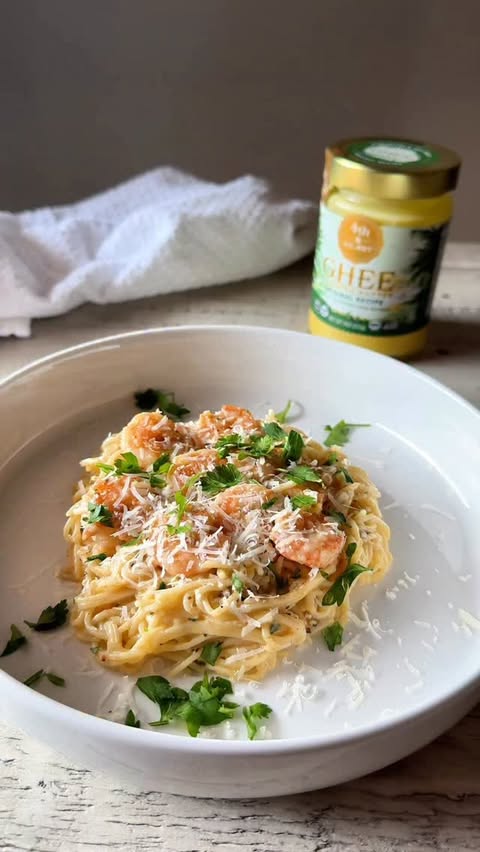 Instagram post by @holleyinthekitchen for 4th & Heart. Caption reads: 🍤 Lemon Butter Shrimp Pasta
 Made with....