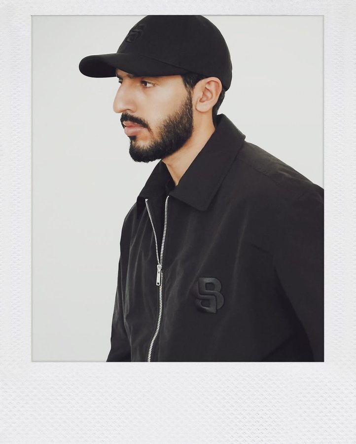 Instagram post by @moalahbabi for BOSS. Caption reads: [...] to unlock your inner power @boss....