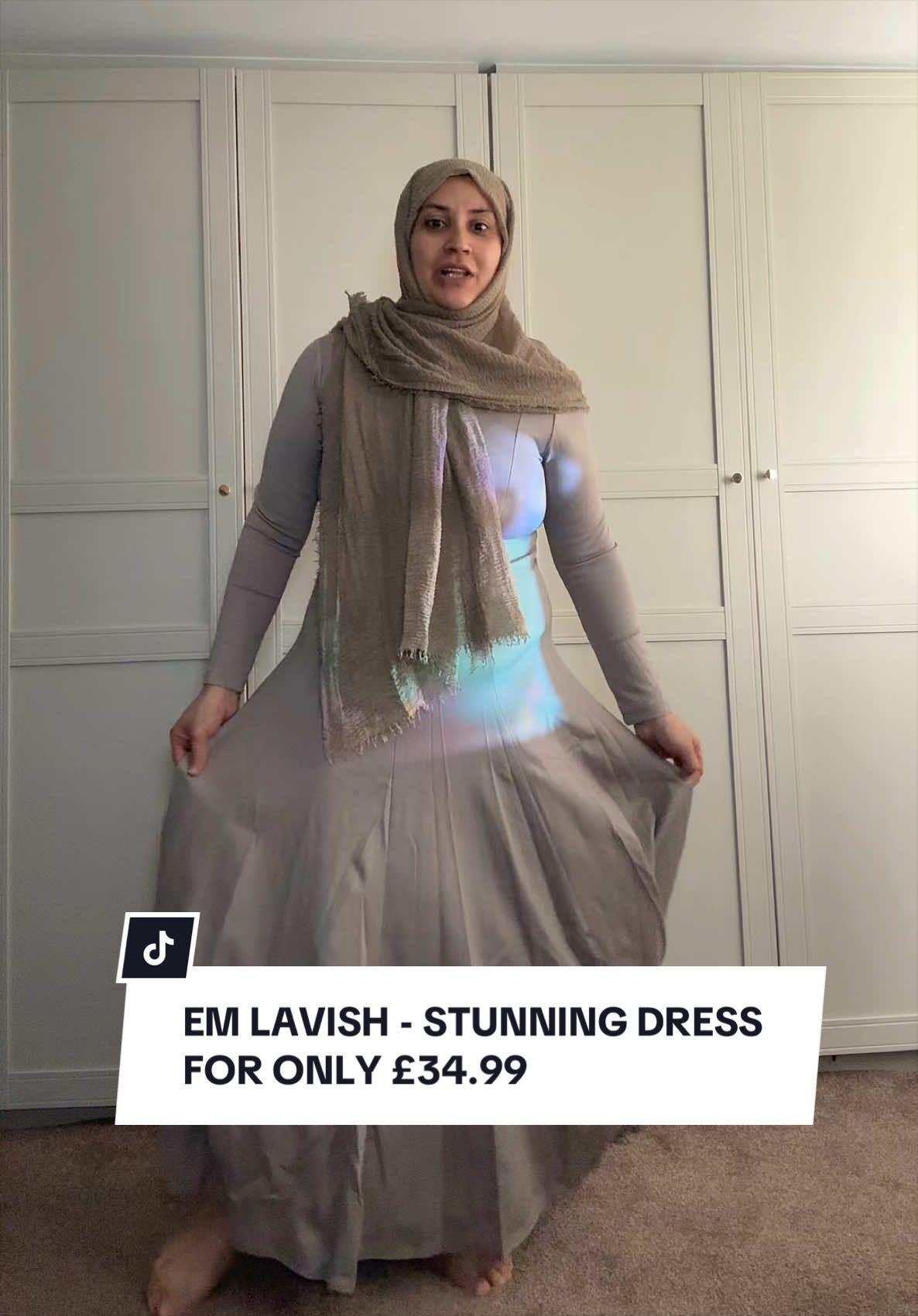 TikTok post by @somayarehman06 for emlavish. Caption reads: @emlavish #dress #fashion #tiktokmademebuyit [...].