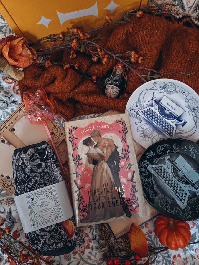 Instagram post by @tranquilreads for Illumicrate. Caption reads: 🍂U N B O X I N G🍂
.
"𝘏𝘦 𝘢𝘯𝘥 𝘴𝘩𝘦 𝘴𝘢𝘵....