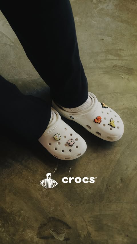 Instagram post by @danialmohdnor for Foot Locker. Caption reads: [...] 🐸 #TheCanvasOfYourLife #CrocsMY....