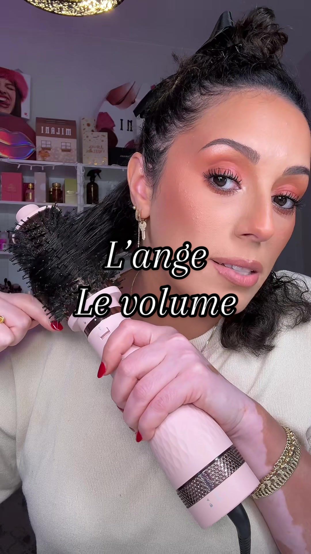 TikTok post by @fathiam6 for L'ange Hair. Caption reads: At home blowout with @langehair Le Volume! Best....