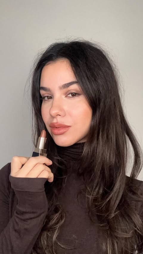 Instagram post by @bella.emar for CAIA Cosmetics. Caption reads: [...] & no smile lines with this technique....