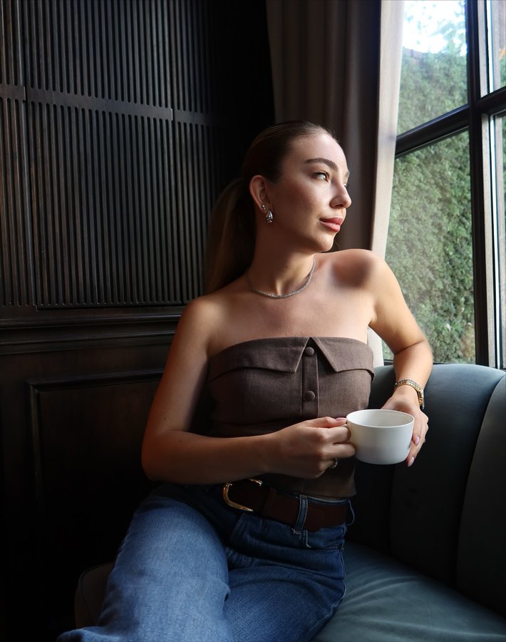 Instagram post by @ezgiiemiroglu for Soho House. Caption reads: Son zamanlarda favorilerim ☕️🍰🌿📸🕯🧣✨ reklam.