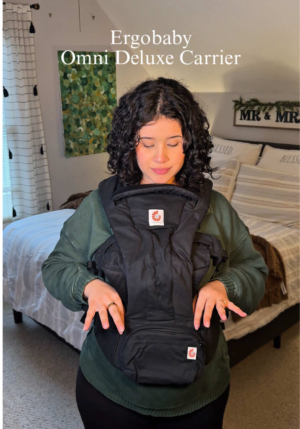 TikTok post by @mrs.isabelabarbosa for Ergobaby. Caption reads: [...] here's the baby carrier I choose from....