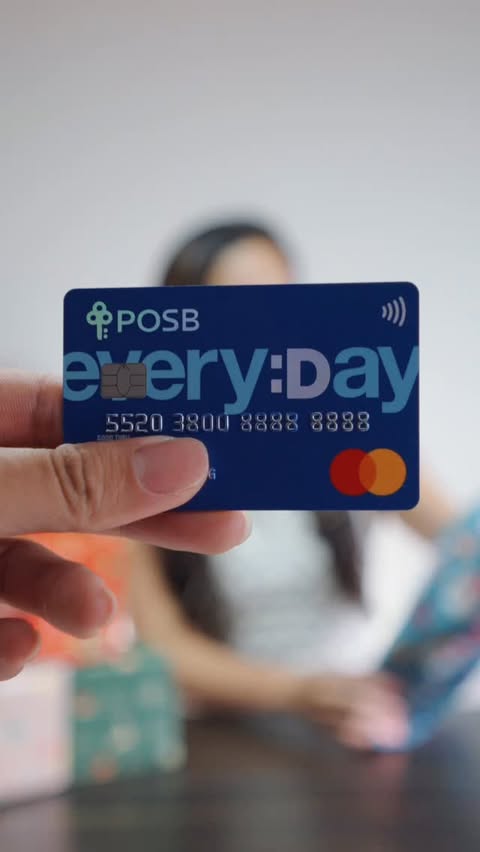 Instagram post by @snnngorious for DBS Bank. Caption reads: [...] me: buys everyone gifts while enjoying....