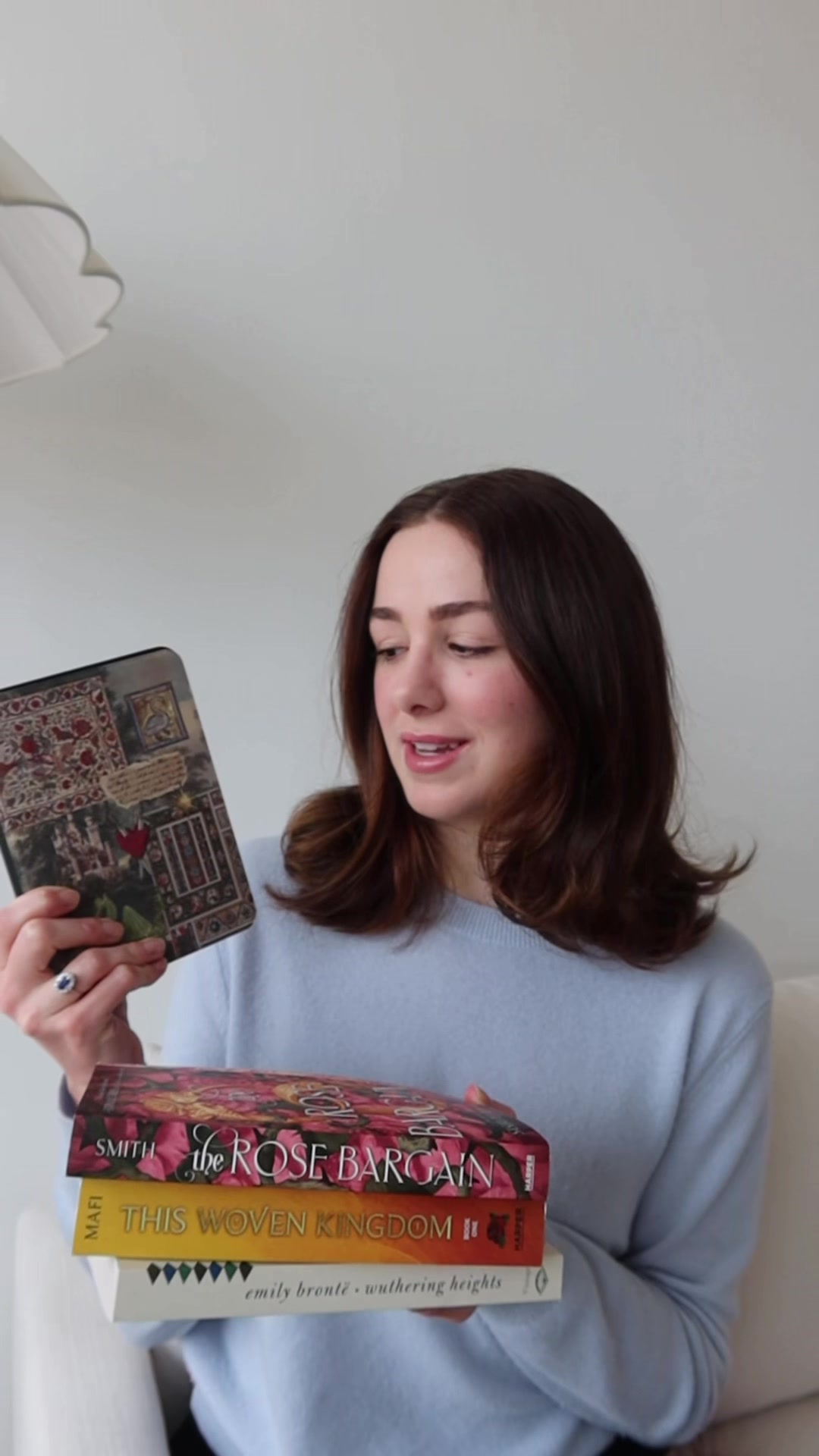 TikTok post by @chloelukasiak25 for BURGA. Caption reads: [...] with my new Kindle case from @BURGA. It's....