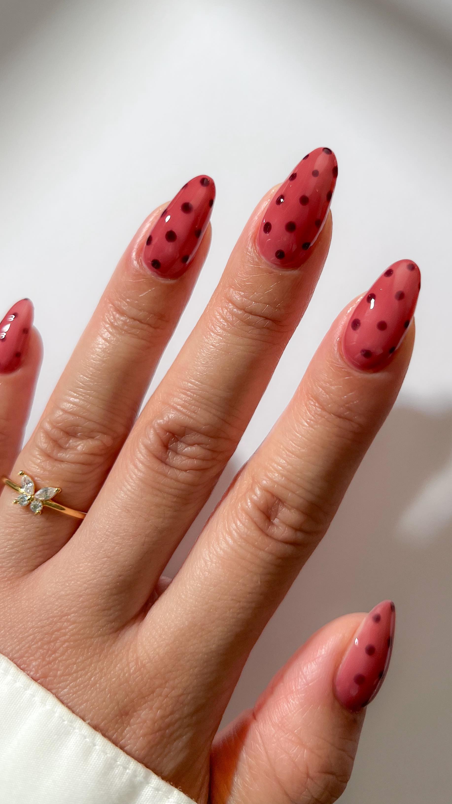 Instagram post by @mydumbnails for Cirque Colors. Caption reads: Ad • Polka dot nails for @cirquecolors new Glazed....