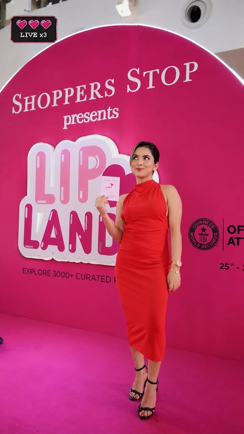 Instagram post by @_thisistrizy_ for Shoppers Stop. Caption reads: [...] So happy to witness Lip Land by Shoppers....