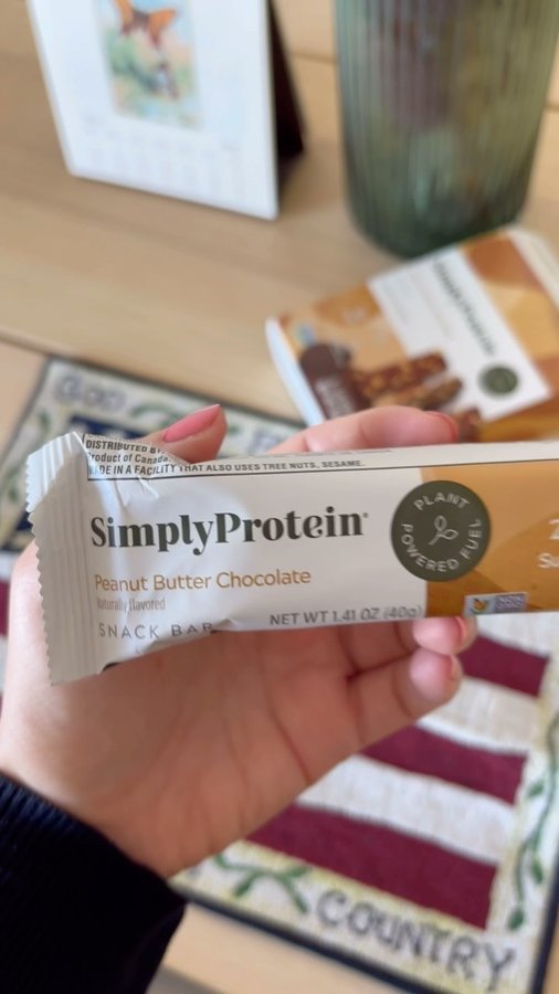 Instagram post by @lena212_w for SimplyProtein. Caption reads: Fro-Yo Bites using #simplyprotein Peanut Butter....