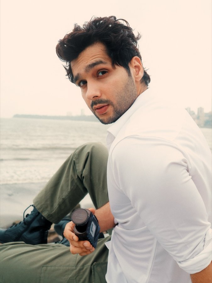 Instagram post by @abhishekkumaarr for Beauty Concepts Pvt Ltd. Caption reads: From the casino to the sea, now the GUESS UOMO....