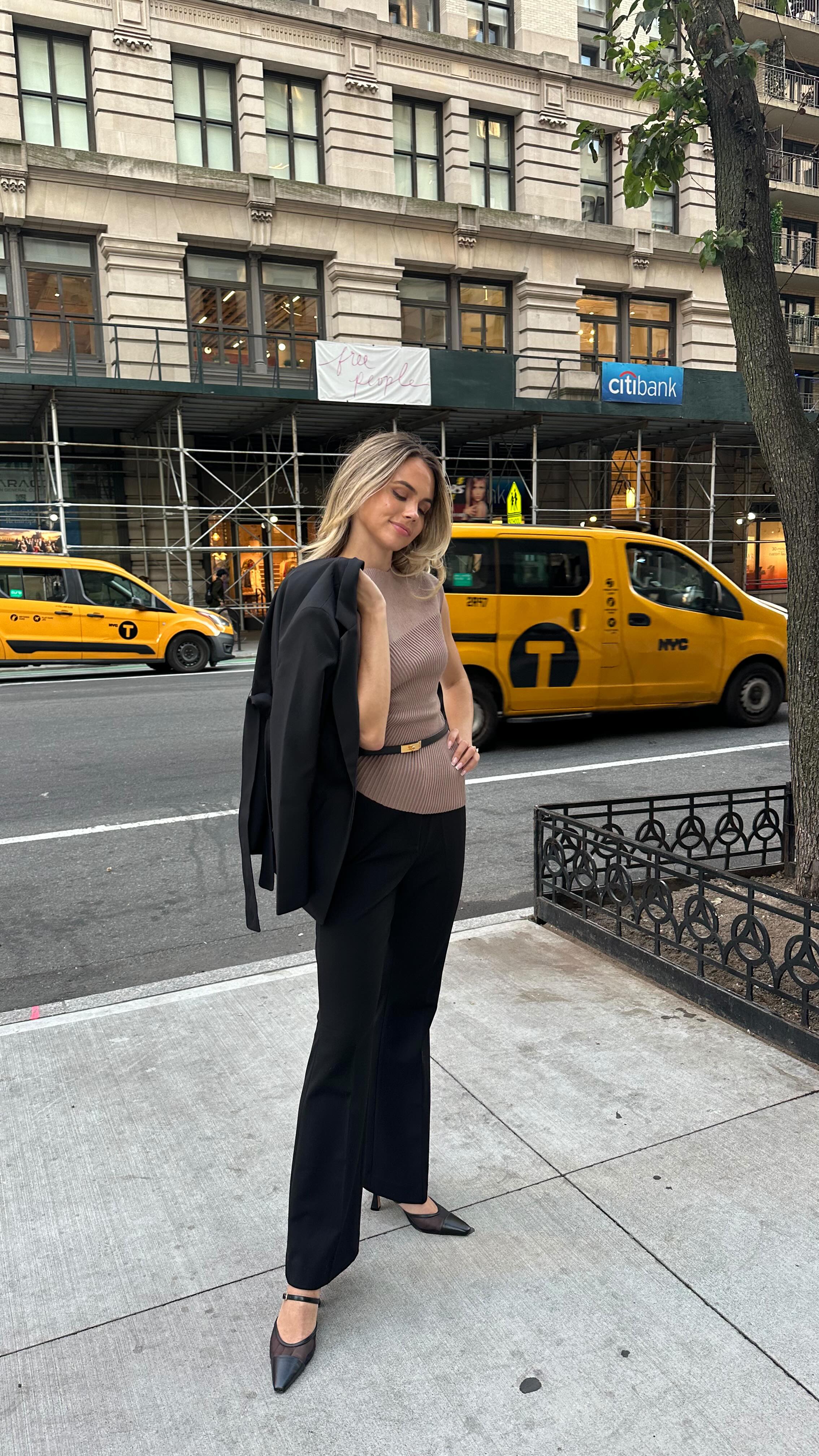 Instagram post by @wallstwardrobe for White House Black Market. Caption reads: The black pant is THE capsule piece this fall. ✨ I....