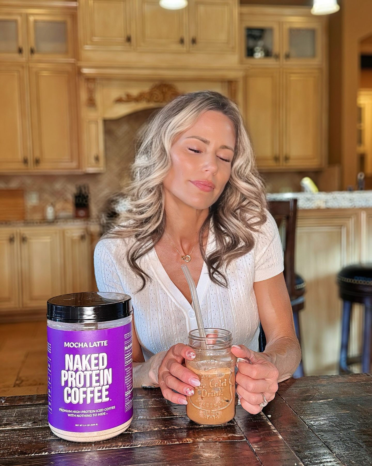 Instagram post by @hannahfit for NAKED nutrition. Caption reads: How do you fit 85-90 grams of protein In one day? ....