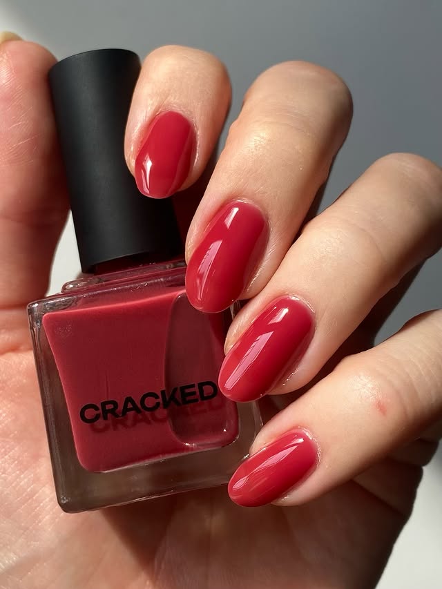 Instagram post by @polished_yogi for Cracked Polish. Caption reads: the yummiest, most lush swatch of @crackedpolish....